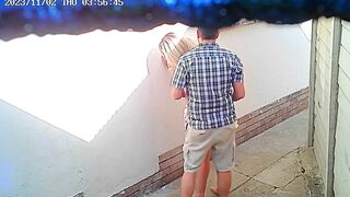 Voyeuristic video of couple engaging in outdoor sex near restaurant captured by CCTV